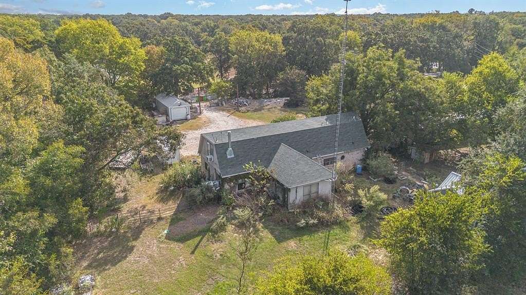 6.7 Acres of Land with Home for Sale in Quinlan, Texas
