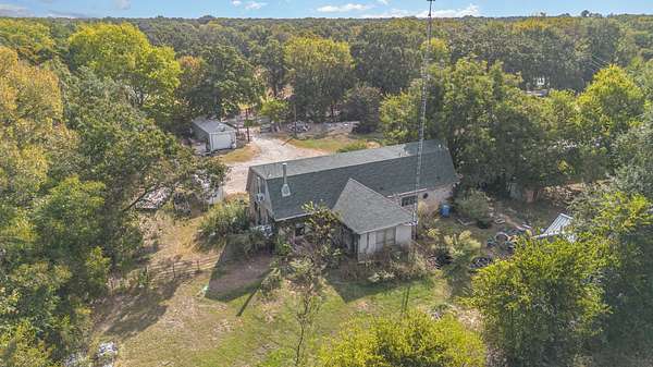 6.7 Acres of Land with Home for Sale in Quinlan, Texas