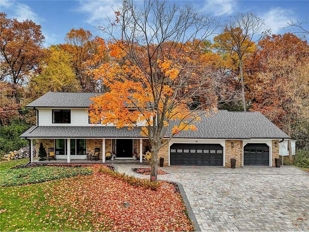 1.57 Acres of Residential Land with Home for Sale in North Oaks, Minnesota