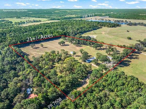 21.6 Acres of Recreational Land with Home for Sale in Chandler, Texas