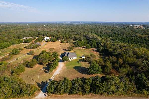 5 Acres of Residential Land with Home for Sale in Jones, Oklahoma
