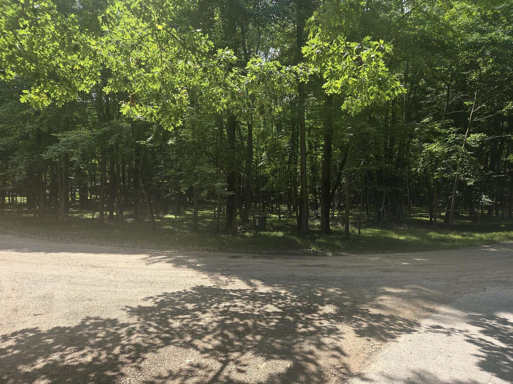 0.86 Acres of Land for Sale in Canadian Lakes, Michigan