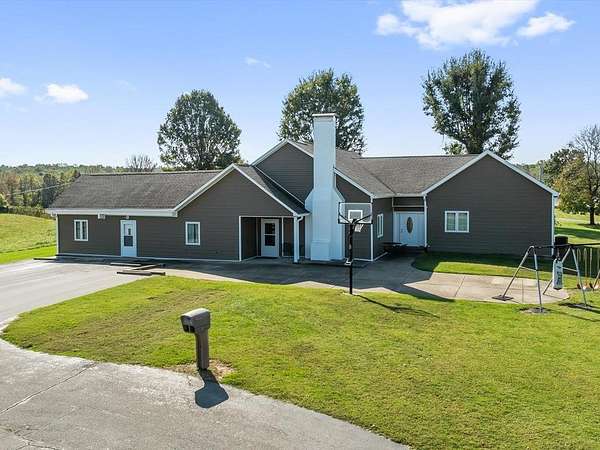 17.7 Acres of Land with Home for Sale in Earlington, Kentucky