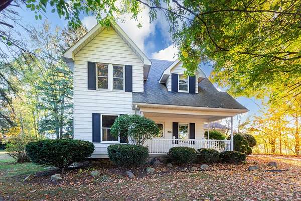 8.2 Acres of Residential Land with Home for Sale in Columbus, Michigan