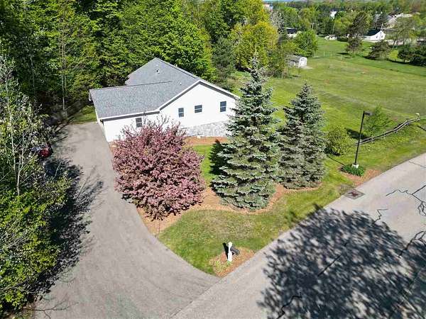 2.63 Acres of Residential Land with Home for Sale in Boyne City, Michigan