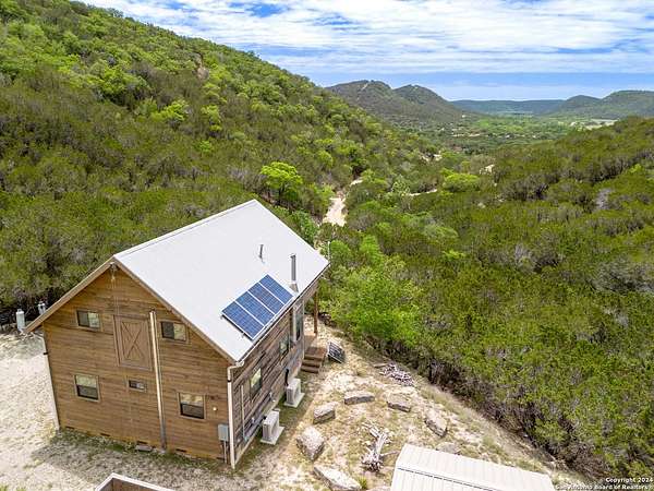 14.8 Acres of Recreational Land with Home for Sale in Medina, Texas