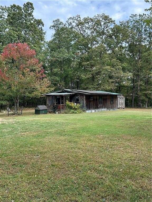 4 Acres of Residential Land with Home for Sale in Oark, Arkansas