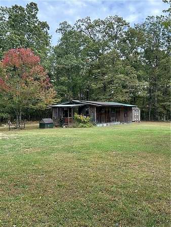 4 Acres of Residential Land with Home for Sale in Oark, Arkansas