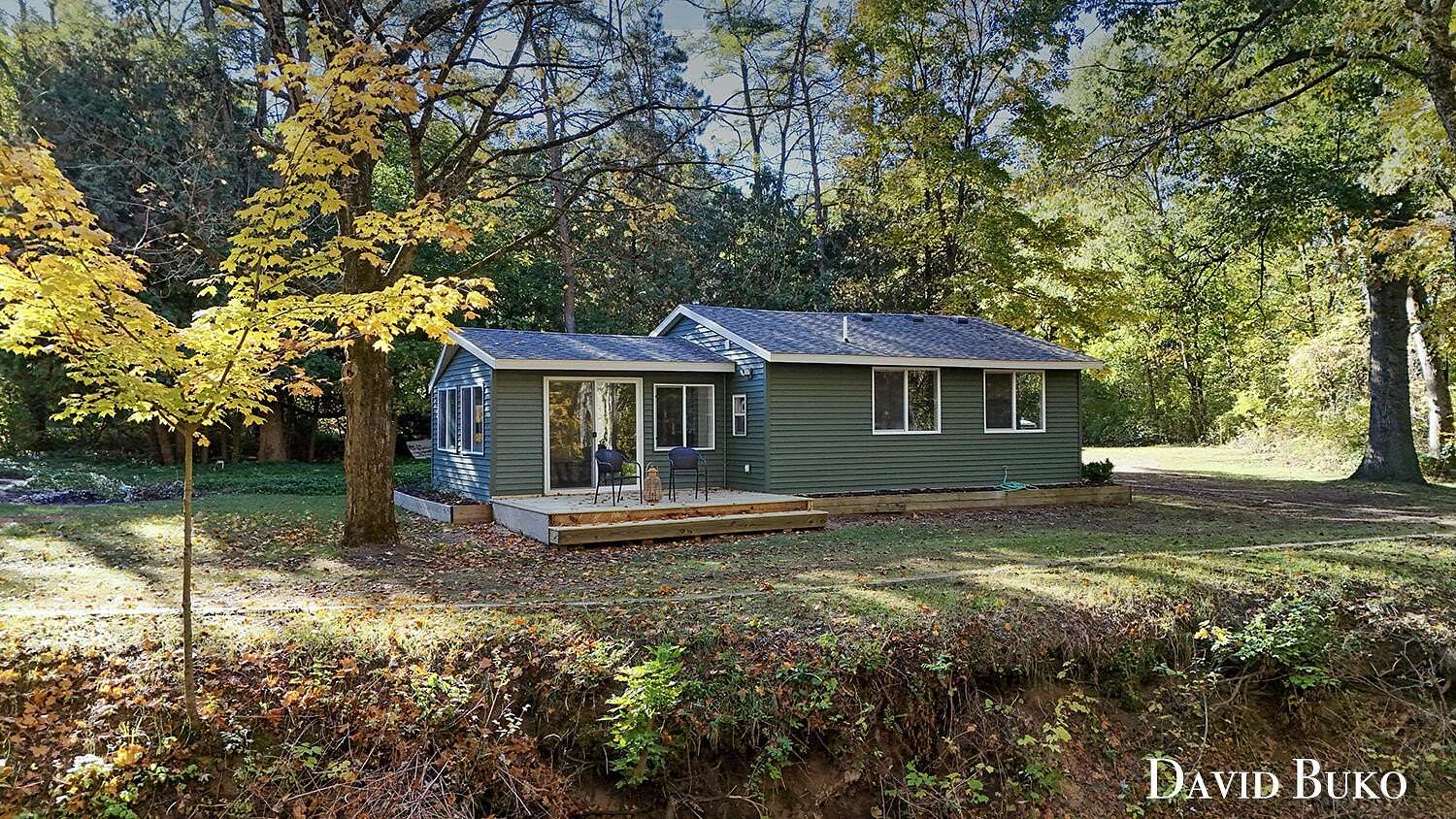 1.65 Acres of Residential Land with Home for Sale in Comstock Park, Michigan