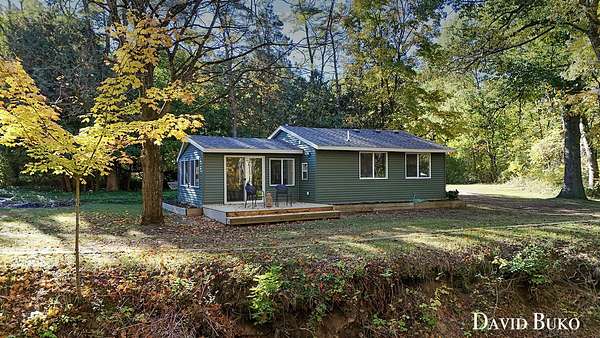 1.65 Acres of Residential Land with Home for Sale in Comstock Park, Michigan