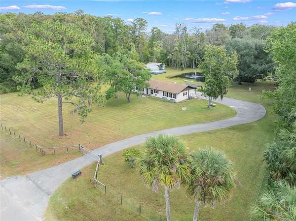 5 Acres of Residential Land with Home for Sale in Kissimmee, Florida