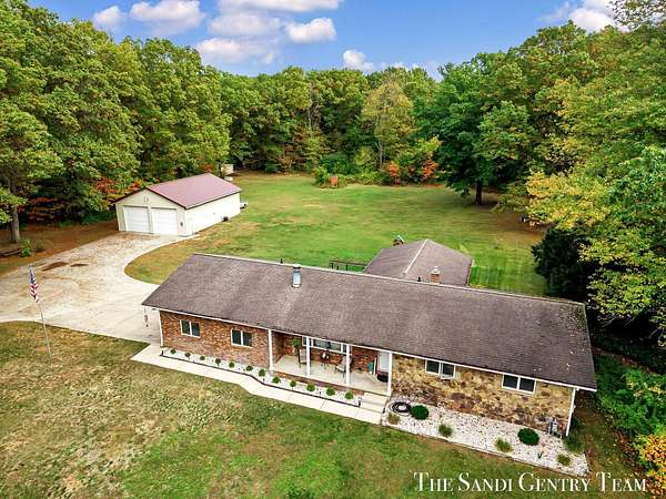 4.62 Acres of Residential Land with Home for Sale in Spring Lake, Michigan