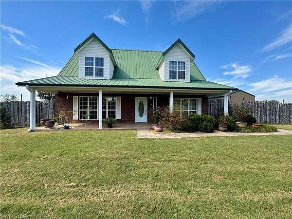 10 Acres of Residential Land with Home for Sale in Wister, Oklahoma