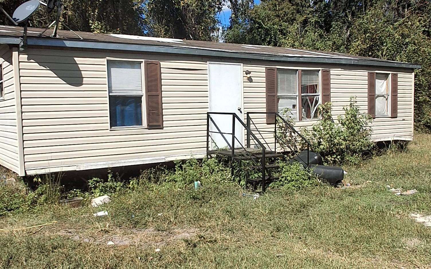 4 Acres of Residential Land with Home for Sale in Lake City, Florida