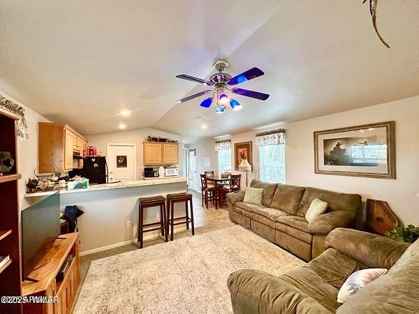 2.7 Acres of Residential Land with Home for Sale in Show Low, Arizona