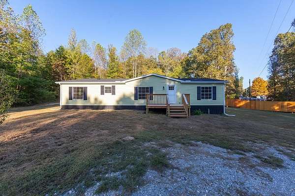 5 Acres of Residential Land with Home for Sale in Holladay, Tennessee