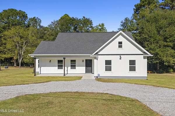 2.1 Acres of Residential Land with Home for Sale in Saucier, Mississippi