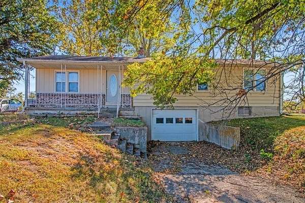 12.4 Acres of Land with Home for Sale in Odessa, Missouri