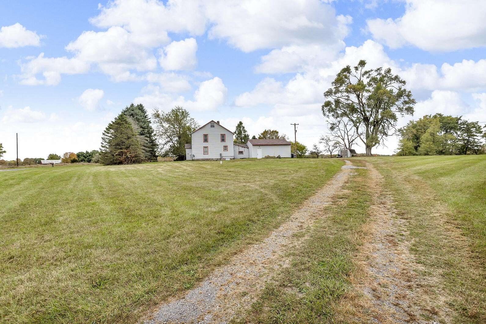 2.75 Acres of Residential Land with Home for Sale in Grass Lake, Michigan