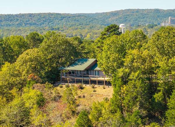 36.4 Acres of Land with Home for Sale in Malvern, Arkansas