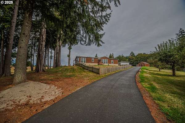 23.5 Acres of Recreational Land with Home for Sale in Rainier, Oregon