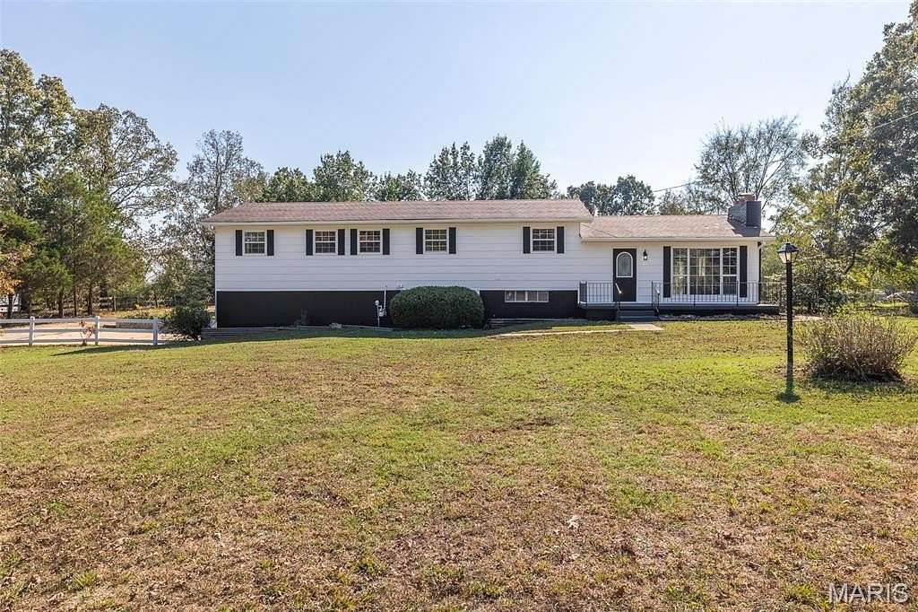 5.9 Acres of Residential Land with Home for Sale in Doniphan, Missouri