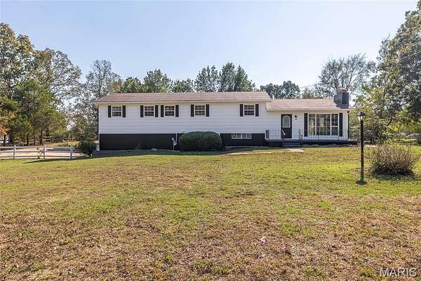 5.9 Acres of Residential Land with Home for Sale in Doniphan, Missouri