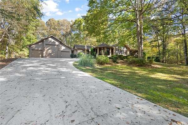 8.44 Acres of Residential Land with Home for Sale in Flowery Branch, Georgia