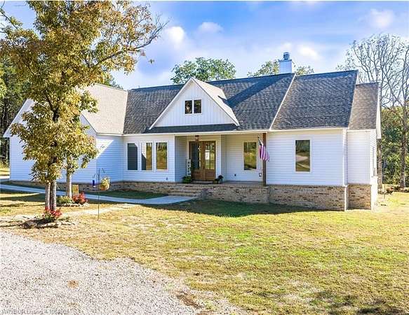 10 Acres of Residential Land with Home for Sale in Mulberry, Arkansas