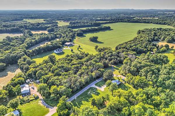 90.4 Acres of Agricultural Land with Home for Sale in Chapel Hill, Tennessee