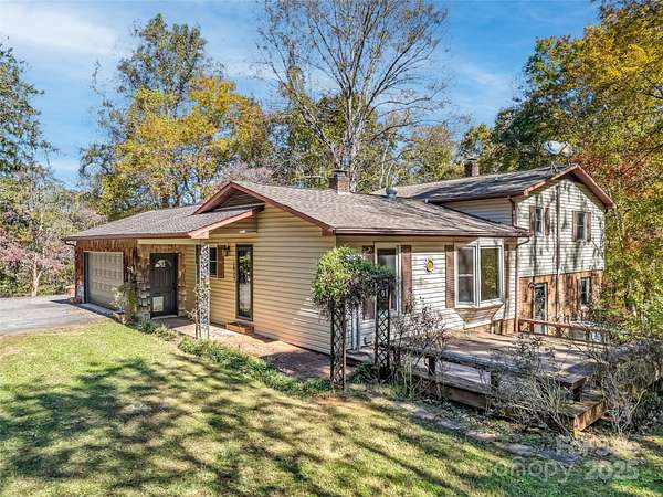 7.48 Acres of Residential Land with Home for Sale in Candler, North Carolina