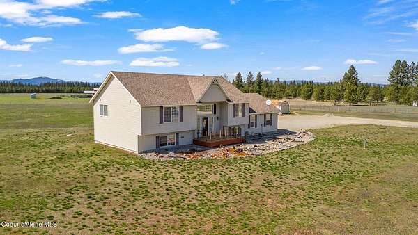 5 Acres of Residential Land with Home for Sale in Athol, Idaho