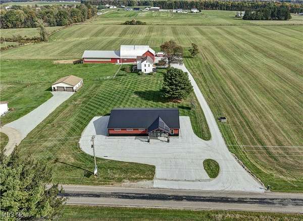 4 Acres of Residential Land with Home for Auction in Fredericksburg, Ohio