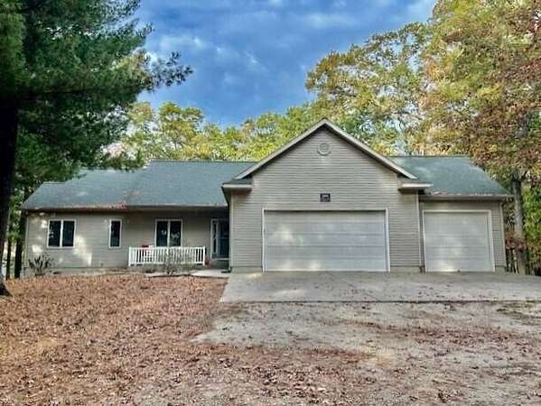 3.29 Acres of Residential Land with Home for Sale in Twin Lake, Michigan