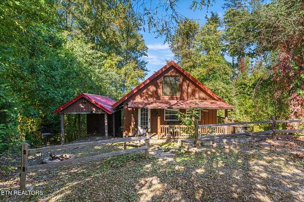 6.58 Acres of Land with Home for Sale in Gatlinburg, Tennessee