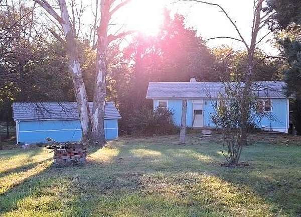 7.9 Acres of Residential Land with Home for Sale in Benton Township, Missouri