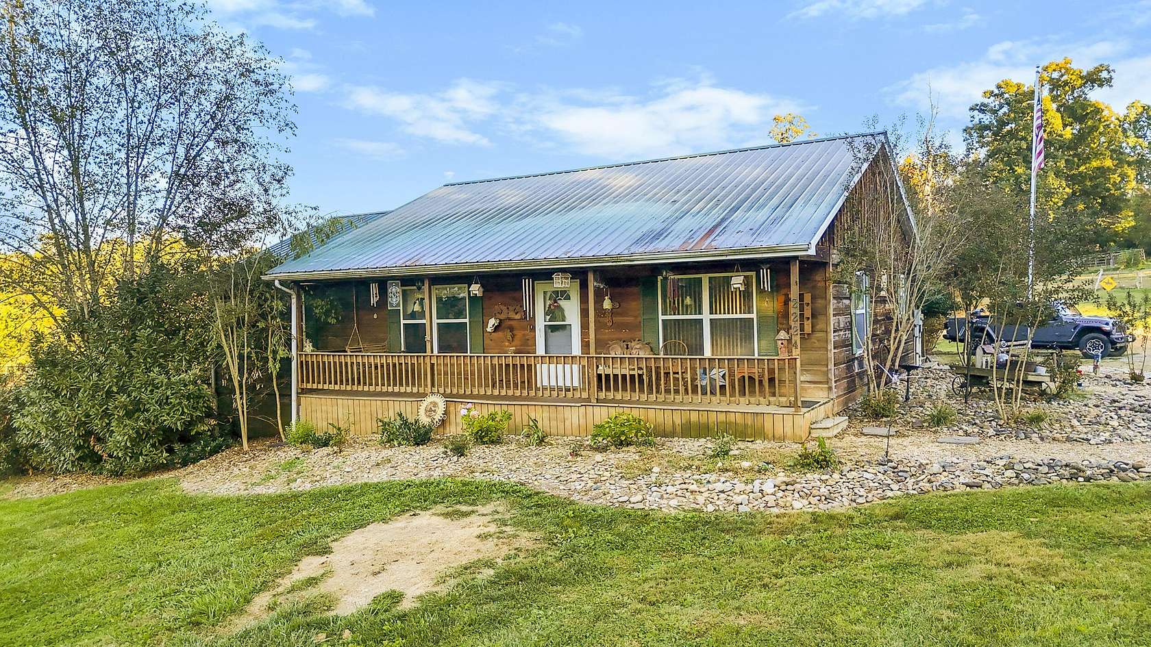 5.49 Acres of Land with Home for Sale in Talbott, Tennessee