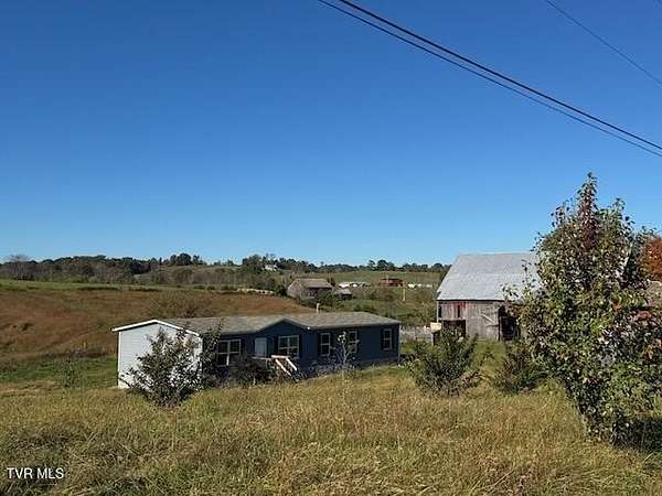 1.6 Acres of Residential Land with Home for Sale in Fall Branch, Tennessee