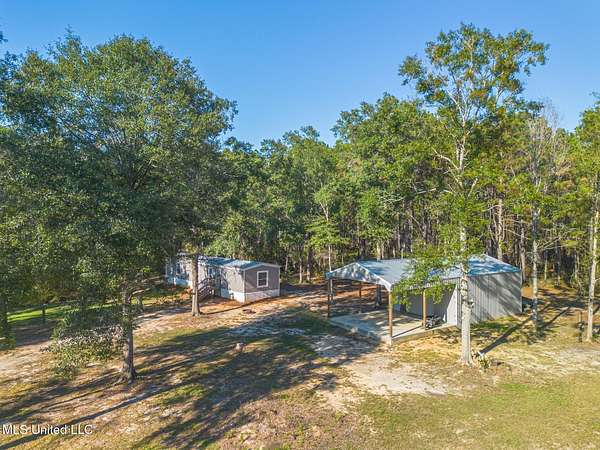 19 Acres of Land with Home for Sale in Saucier, Mississippi