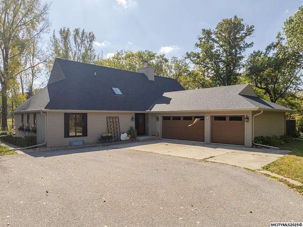 2.25 Acres of Residential Land with Home for Sale in Mason City, Iowa