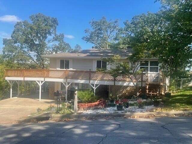 0.24 Acres of Residential Land with Home for Sale in Branson, Missouri