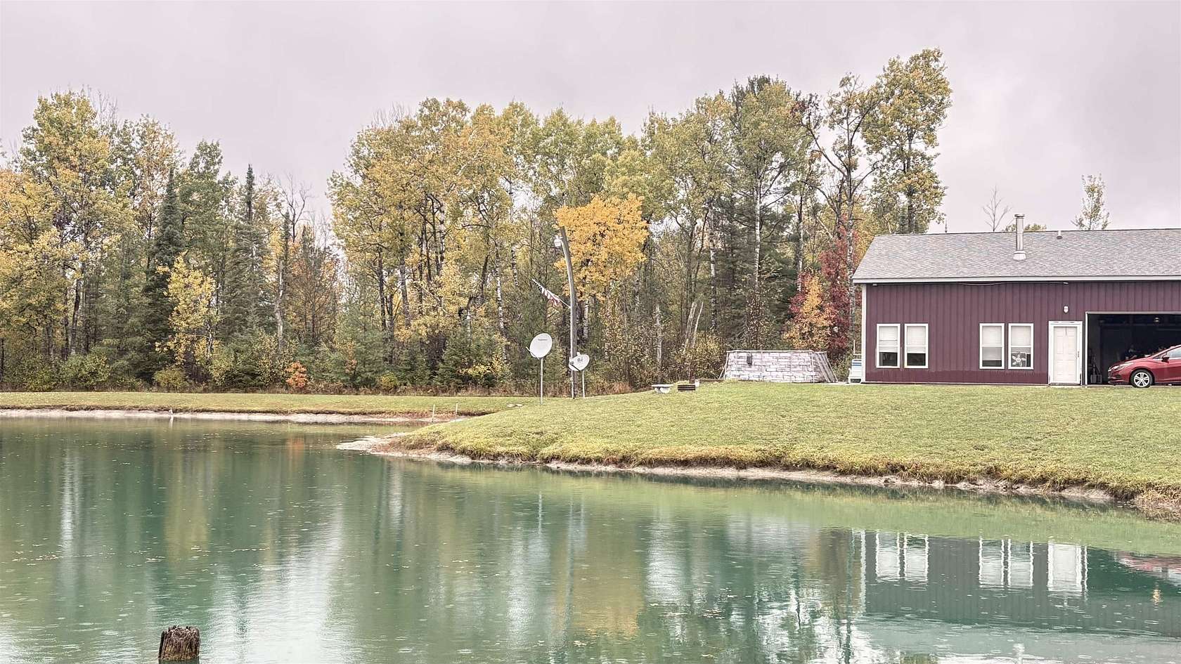 2.5 Acres of Residential Land with Home for Sale in Houghton Lake, Michigan