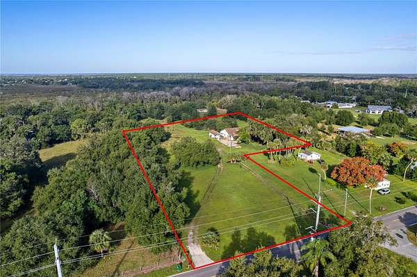 4 Acres of Residential Land with Home for Sale in Mims, Florida