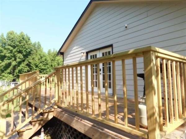 5.77 Acres of Land with Home for Sale in Romance, Arkansas