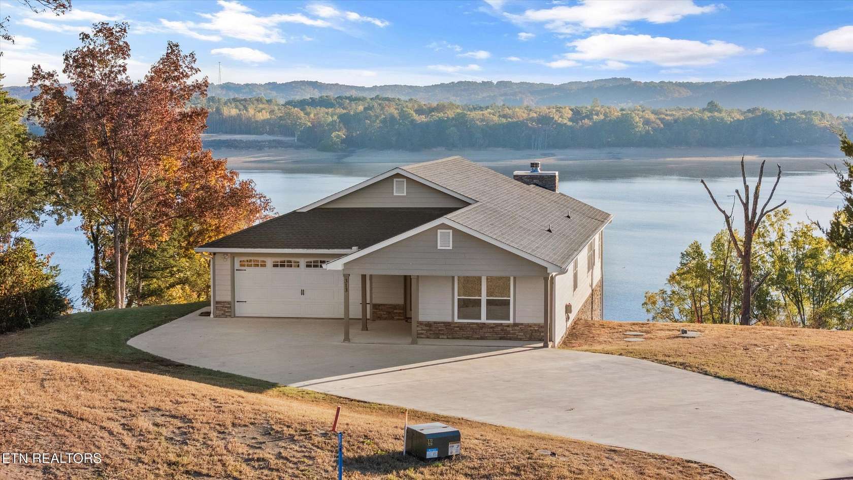 4.39 Acres of Residential Land with Home for Sale in Dandridge, Tennessee