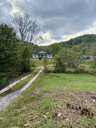 5 Acres of Land with Home for Sale in Bethpage, Tennessee