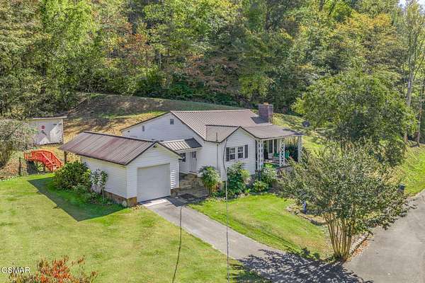 65 Acres of Land with Home for Sale in Seymour, Tennessee