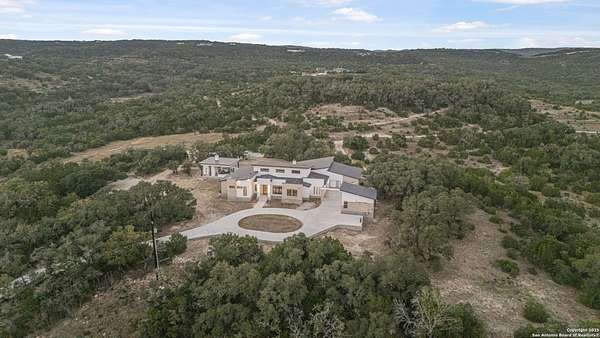 10.4 Acres of Land with Home for Sale in Helotes, Texas