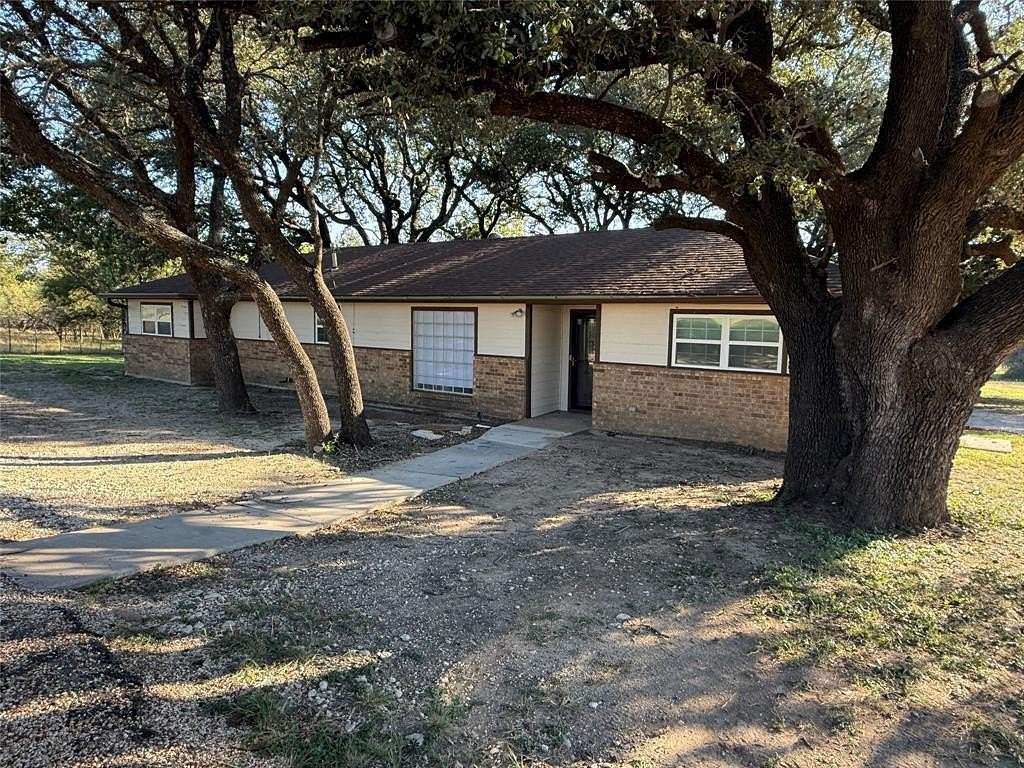 2 Acres of Residential Land with Home for Sale in Comanche, Texas