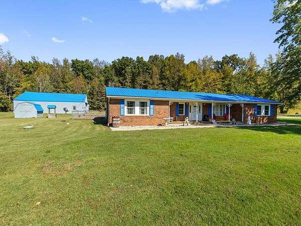 2 Acres of Land with Home for Sale in Nortonville, Kentucky